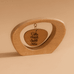 Wooden Hanging Ornament – “مهما انحنى بك الطريق”